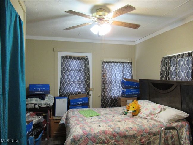 Bedroom #1 with ceiling fan | Image 15