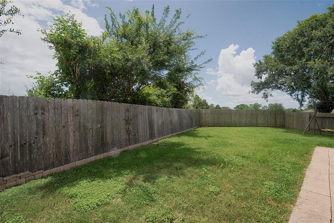 A view of the backyard from the covered patio. And, there are no back neighbors. | Image 30