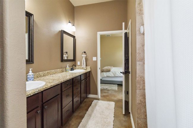 Ensuite bathroom featuring double vanity | Image 25