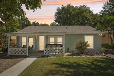 View of front facade featuring a lawn | Image 1