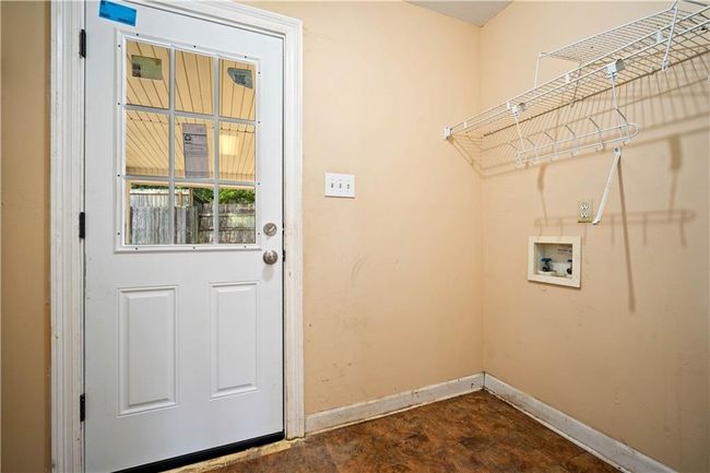 Laundry room featuring baseboards and washer hookup | Image 25