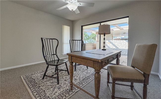 Guest bedroom/Office with patio and access to exterior. | Image 9