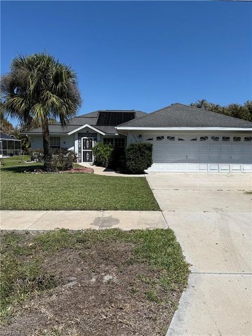 2612 7th St W, LEHIGH ACRES, FL, 33971-1450 | Card Image