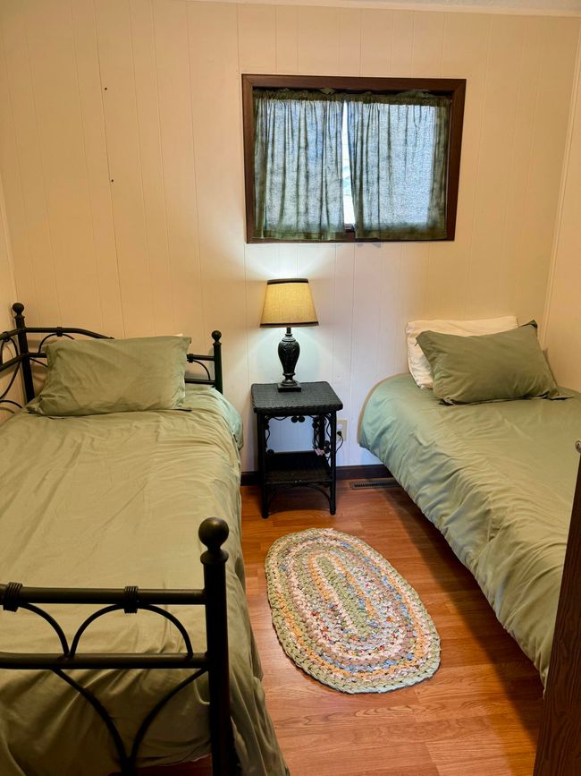 8288 Portage St, House other with 4 bedrooms, 3 bathrooms and null parking in Onekama MI | Image 19