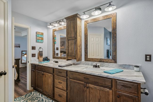 Master bathroom with dual sinks and dual closets | Image 19