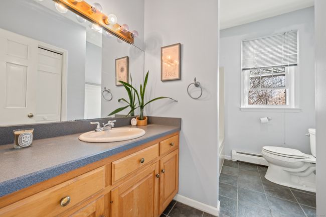Main floor full bath tub with shower | Image 26