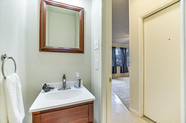Bathroom featuring tile patterned flooring and vanity | Image 17