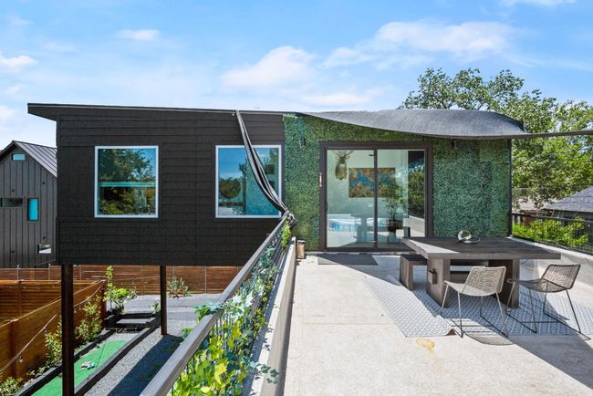 View of patio with outdoor dining area | Image 4