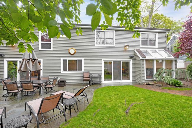Rear view of property with a yard and a patio area | Image 28