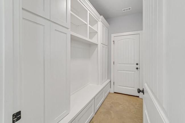 Mudroom with concrete floors | Image 19