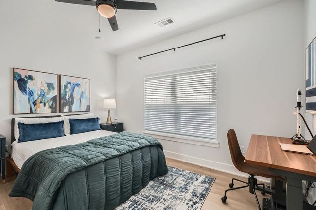 Master Bedroom with light wood-type flooring and a desk | Image 12