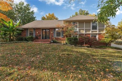 View of front of property featuring a front yard | Image 1