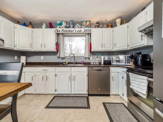 1106 41 Avenue N, Home with 4 bedrooms, 2 bathrooms and 5 parking in Lethbridge AB | Image 11