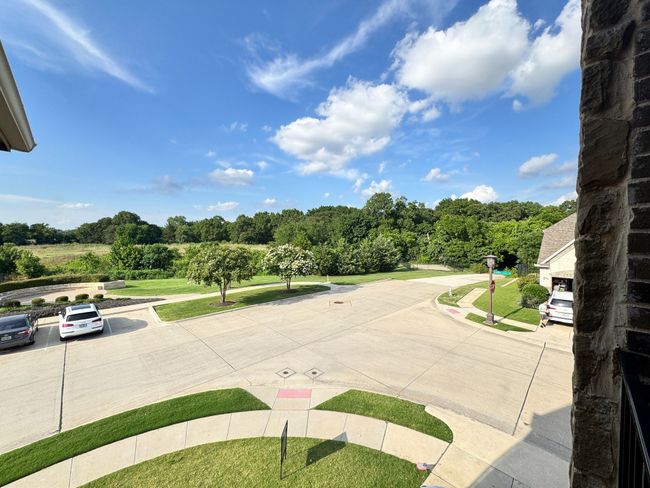 greenbelt view and street scene from upstairs | Image 13