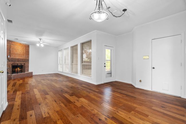 The living room overlooks the back yard. | Image 12