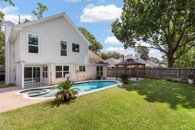 Spacious backyard with pool and spa, gazebo, and no rear neighbors.Spacious backyard with pool, gazebo, and no rear neighbors. | Image 24