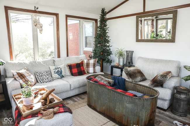 living room featuring plenty of natural light, wood finished floors, and vaulted ceiling | Image 32