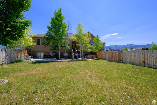 Fully fenced private back yard with spa | Image 31