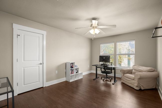 Office featuring baseboards, dark wood-style flooring, and ceiling fan | Image 15
