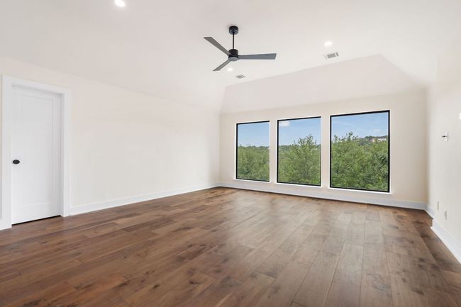 The spacious upstairs game room offers endless possibilities for entertaining, relaxing, or spending time with family. | Image 21