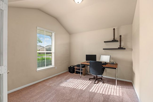 Carpeted office space with lofted ceiling and baseboards | Image 5