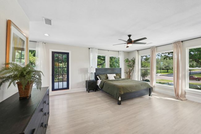 Bedroom with baseboards, light wood-style floors, recessed lighting, and a ceiling fan | Image 19