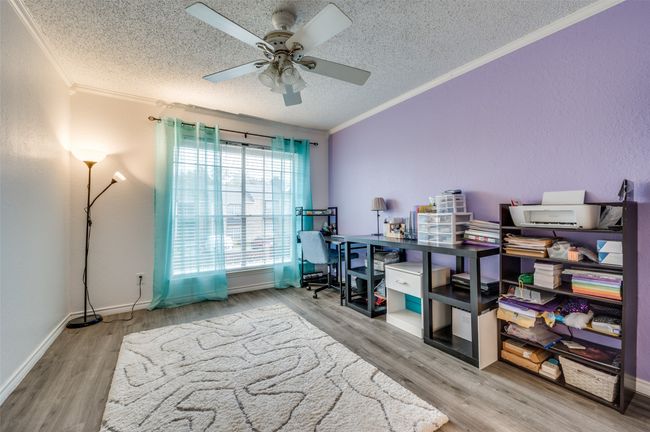 2nd bedroom with crown molding, ceiling fan, a textured ceiling, and hardwood / wood-style flooring | Image 10