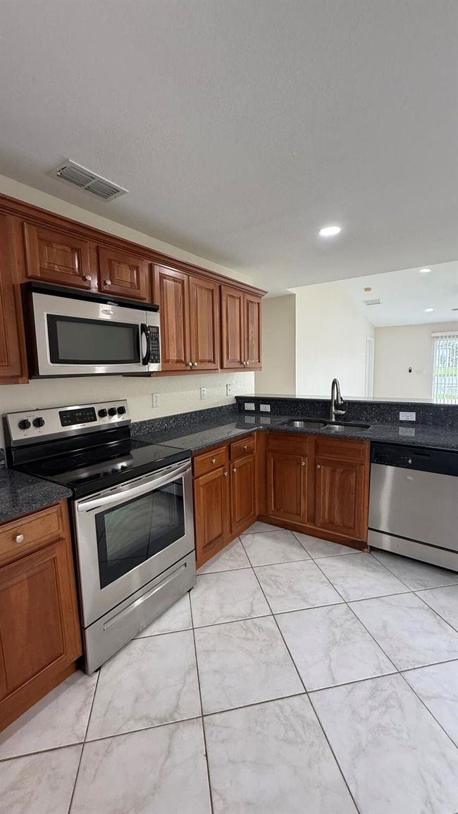 2131 Sw Newport Isles Boulevard Boulevard, House other with 3 bedrooms, 2 bathrooms and null parking in Port St Lucie FL | Image 12