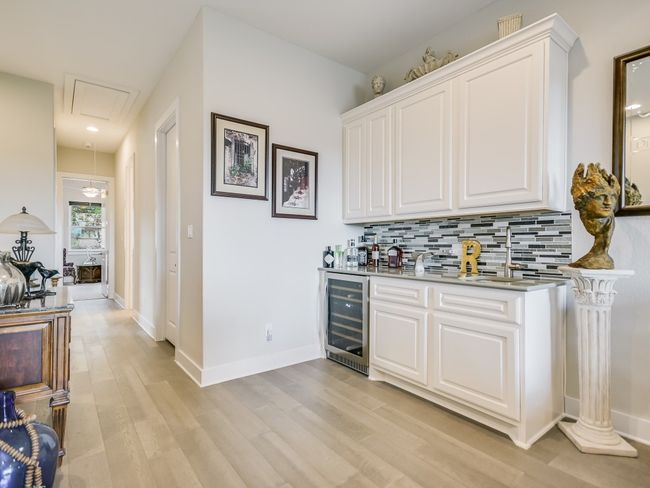 Upstairs living room wet bar | Image 10