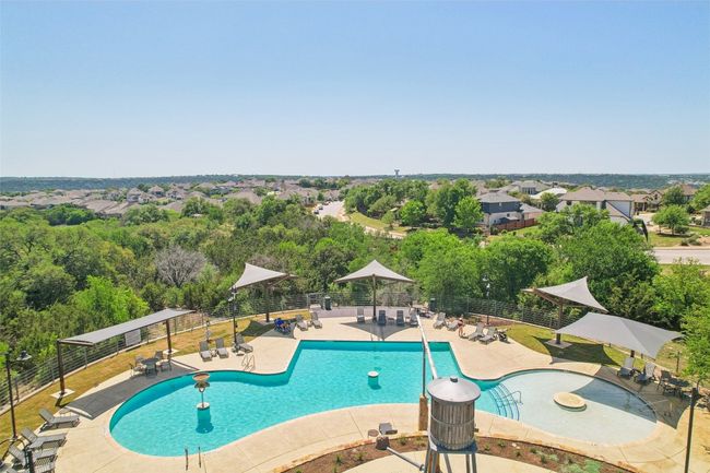 Pool featuring a patio and fence | Image 36