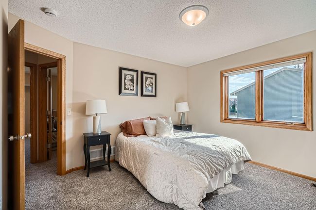 787 104th ct ne - Web Quality - 016 - 19 Primary Bedroom.jpg | Image 13