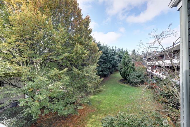 Back lawn/garden area provides privacy from your back deck | Image 16