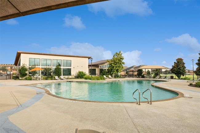 Community pool featuring a patio | Image 17