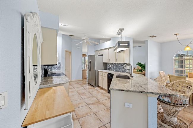 12950 Sw Pembroke Cir S, House other with 3 bedrooms, 2 bathrooms and null parking in LAKE SUZY FL | Image 24