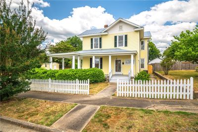 View of front of home with a porch | Image 1