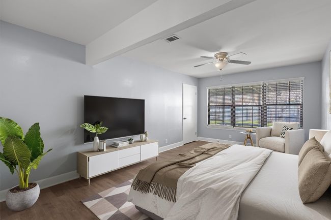 Bedroom with visible vents, baseboards, wood finished floors, and a ceiling​​‌​​​​‌​​‌‌​‌‌​​​‌‌​​‌‌​‌​​​​​‌ fan | Image 22