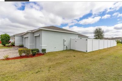 303 Blue Lake Circle, House other with 4 bedrooms, 2 bathrooms and null parking in Kissimmee FL | Image 2