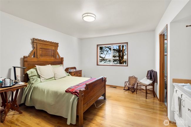Bedroom #1 with private sink & cabinet | Image 14