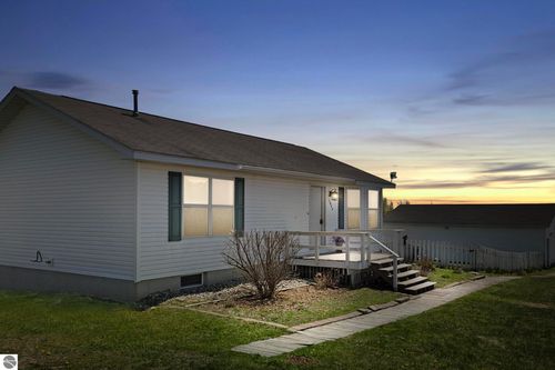 3857 Sutter Ln, Kewadin, MI, 49648-9183 | Card Image