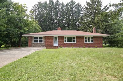 Single story home with a front lawn | Image 1