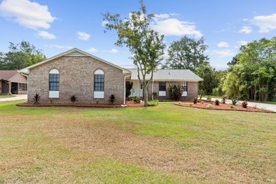 Beautifully Landscaped in front and back | Image 2