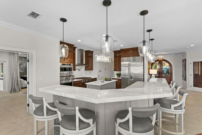 Island with bar seating | Image 13