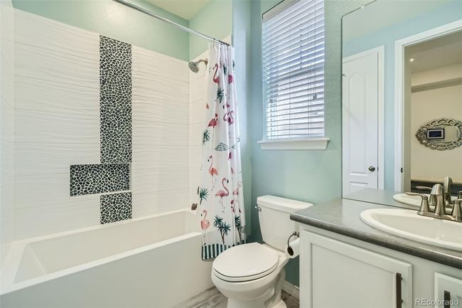 Upgraded main full bathroom with linen closet. | Image 12