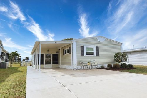 1043 Royal Palm Dr, Barefoot Bay, FL, 32976-7011 | Card Image