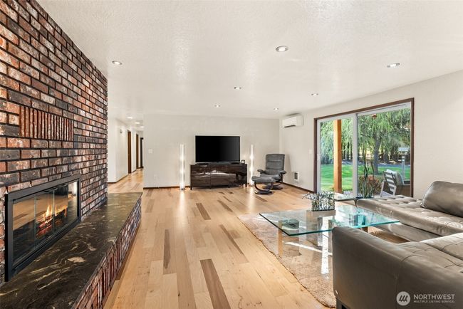 Great room leading to covered patio | Image 6