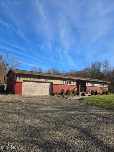 Ranch-style home with a garage | Image 2