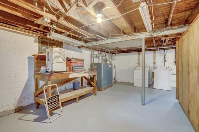Unfinished below grade area with independent washer and dryer | Image 17