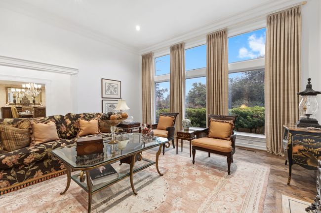 Living room with parquet floors and natural light | Image 4