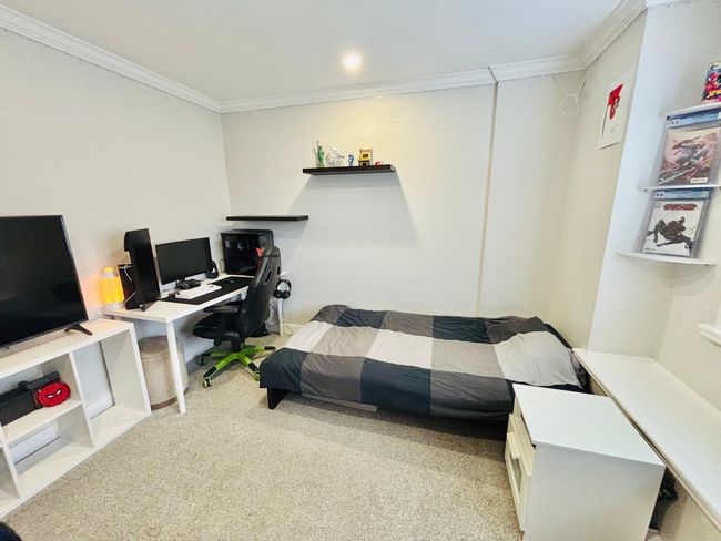 Office space with crown molding and light colored carpet | Image 25