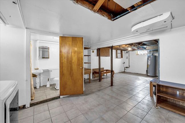 Storage area & bathroom | Image 22